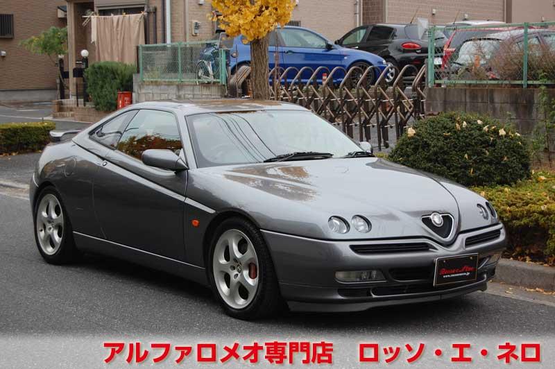 アルファロメオＧＴＶ　中期・3.0Ｖ6・6ＭＴ　グレー・赤レザー　マフラー＆ローダウン